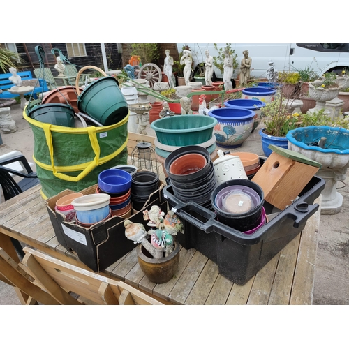 169 - Very large collection of garden tools,pots, ornaments and bird feeder.