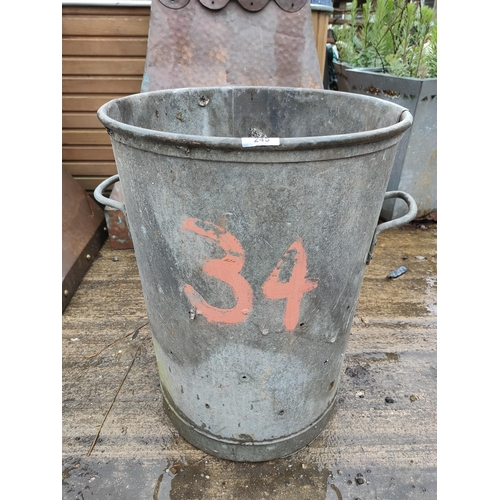 245 - Vintage metal outside rubbish bin