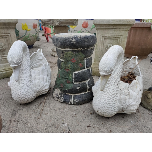 90 - 2 swan planters and concrete plinth
