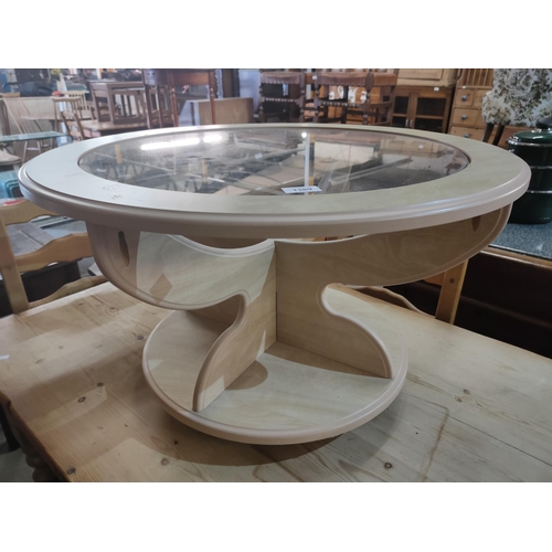 1389 - Design inspired contemporary round glass coffee table.