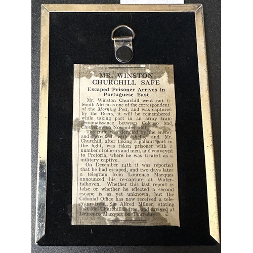 1044 - Framed picture of a young Winston Chruchill with original newspaper clipping to the back