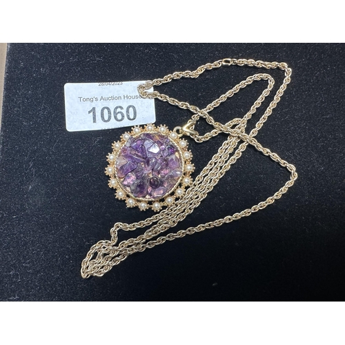 1060 - Beautiful dress necklace with purple stones and long gold plated chain