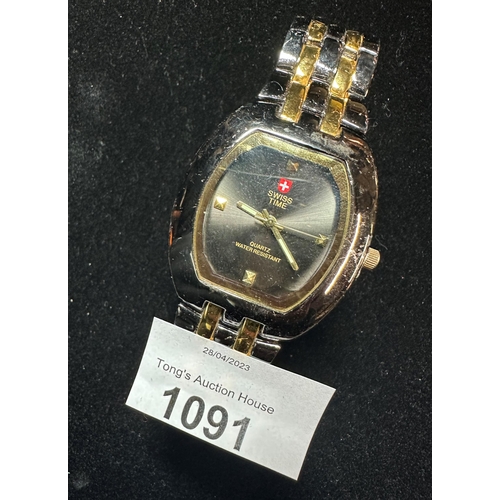 1091 - Beautiful Swiss Time Quartz movement black face black and gold toned metal strap