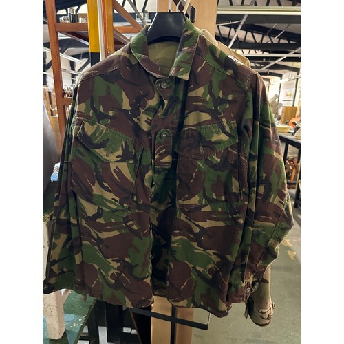 712 - Three military style Camo shirts/jackets