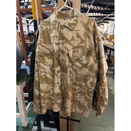 712 - Three military style Camo shirts/jackets