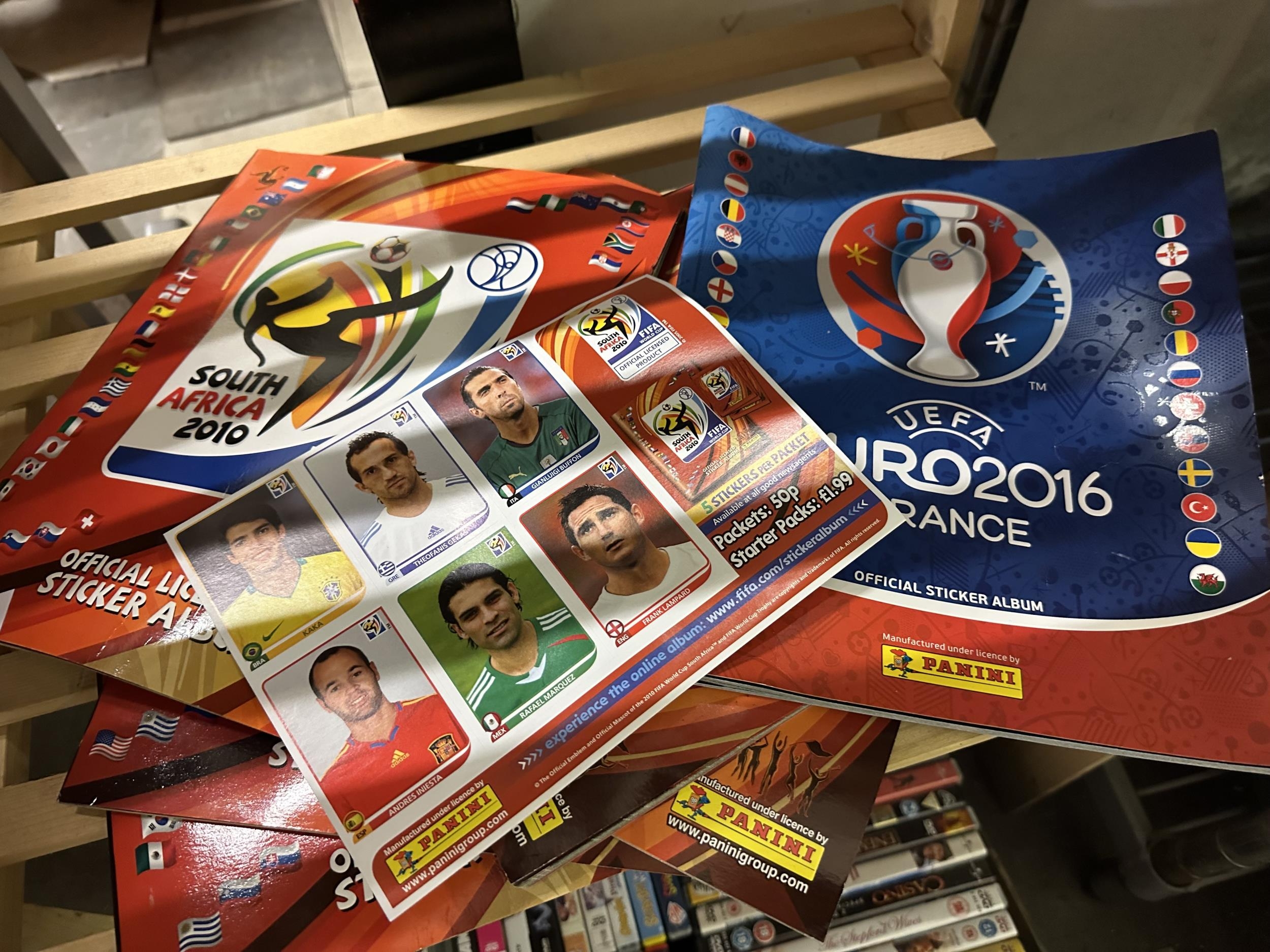 Collection of mostly empty football sticker albums including UEFA euro ...