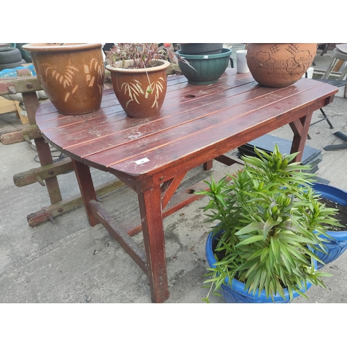 29 - Solid wooden garden table