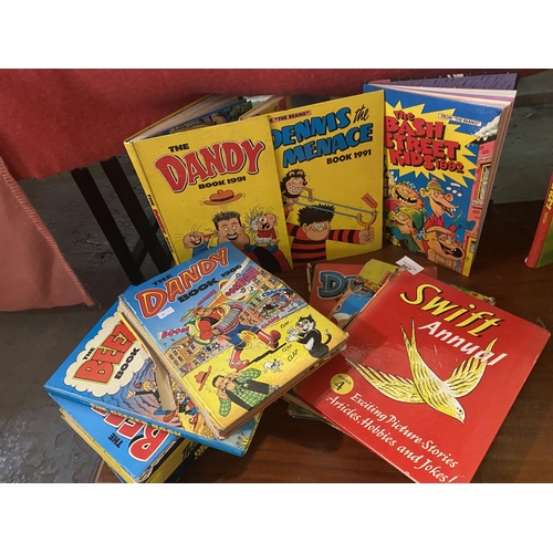 867 - Large collection of vintage Annuals including Dandy Swift and bash street kids 12 in total