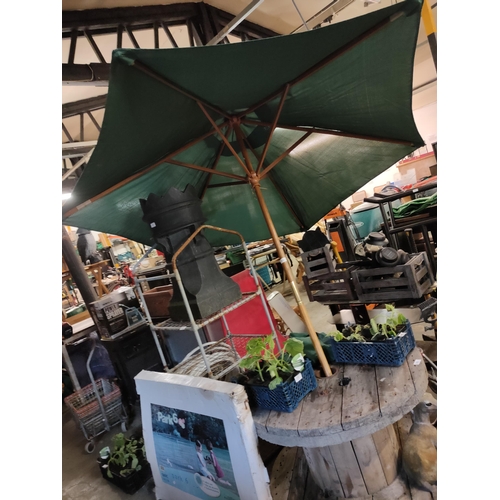 374 - LARGE WOODEN PARASOL WITH GREEN CANVAS WITH BAG