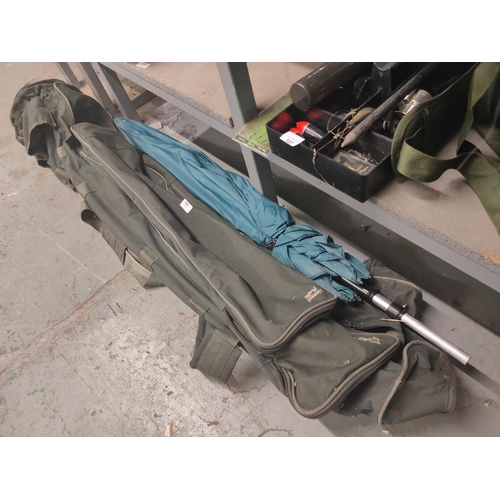 585 - NASH FISHING ROD BAG AND FISHING UMBRELLA