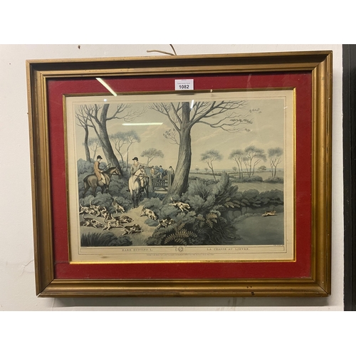 1082 - Hunting scene picture with red mount and gold frame.