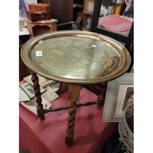 1248 - Indian Brass charger on folding wooden stand