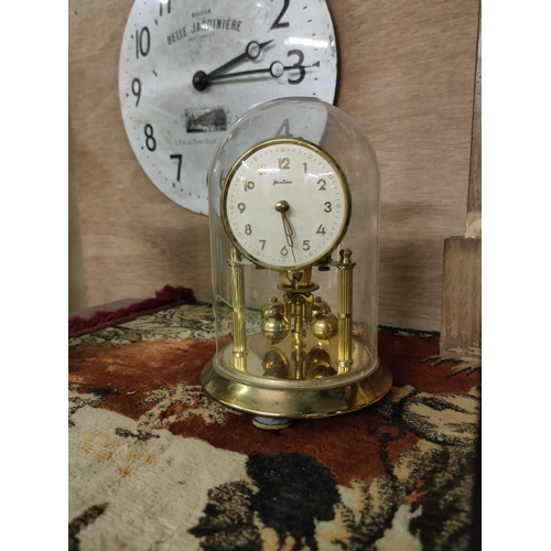 1379 - Bentime manual anniversary clock glass dome has piece missing