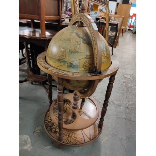 1741A - Large vintage style globe on ornate stand. Opens up to provide secret storage, perhaps for your favo... 