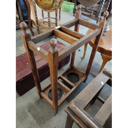 1728 - Stylish vintage wooden double umbrella and cane stand. Very useful piece for a traditional hallway