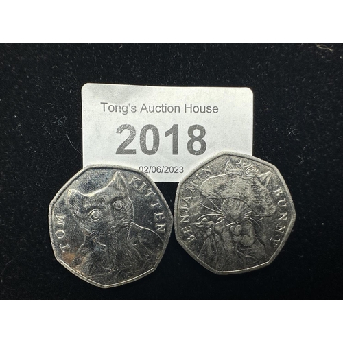 2018 - Two collectible Beatrix Potter 50p coins including Tom Kitten and Benjamin Bunny