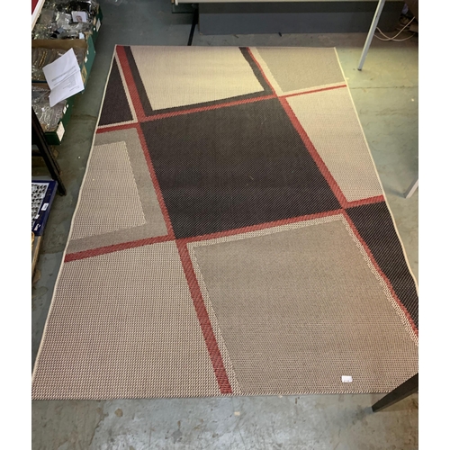 2114 - Extremely large patterned floor rug. Approx 160x230cm