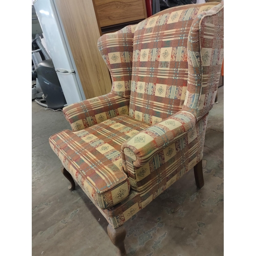 105A - PATTERNED WING BACK ARM CHAIR