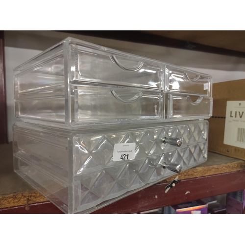 421 - 2 clear perspex storage units, perfect for jewellery or cosmetics.