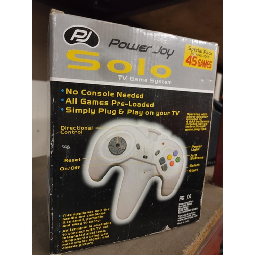 586 - AS NEW IN BOX Power Joy solo tv game system includes 45 built in games.