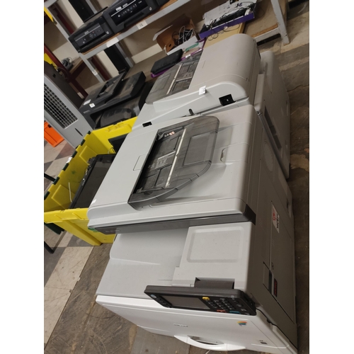 612 - two Ricoh Aticio MP C305SP laser jet printers.