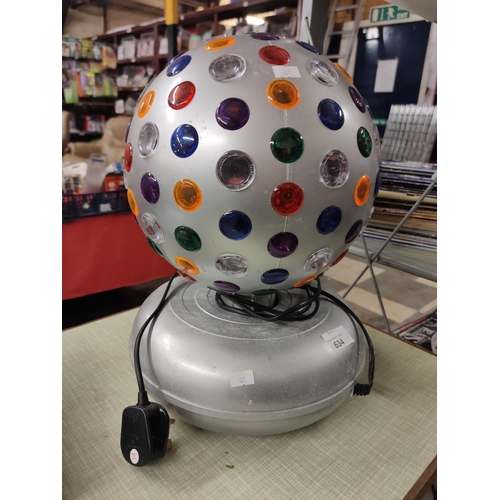 634 - Large rotating light globe, measures approx 38cm tall x 30 cm across.