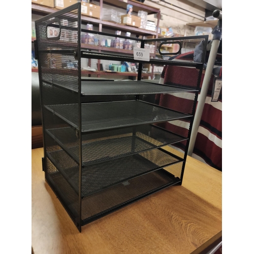 659 - A very useful metal storage rack, fits A4 papers