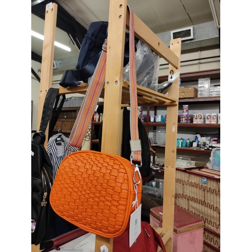 680 - Gorgeous brand new faux leather shoulder bag in a lovely woven orange design with adjustable strap