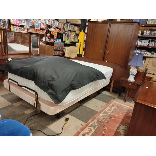 691 - Double bed frame with dark mahogany coloured headboard and matching double wardrobe