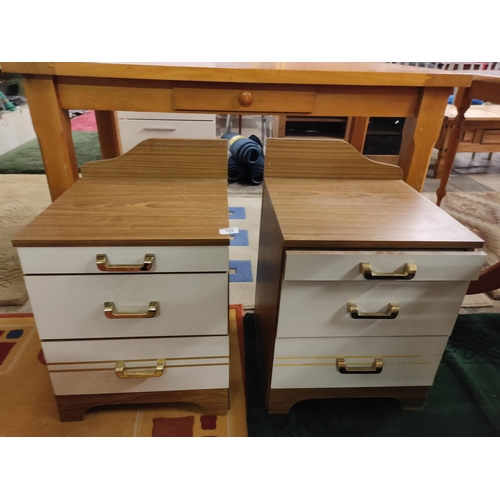 725 - Retro 1970's bedside cabinets with two draws and sliding shelf.