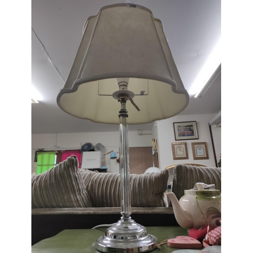 339 - Beautiful chrome based table lamp with a jaquard style shade. Nice piece