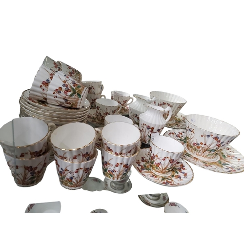 24 - A lovely large tea set with a pretty meadow flower design