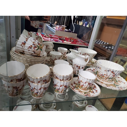 24 - A lovely large tea set with a pretty meadow flower design