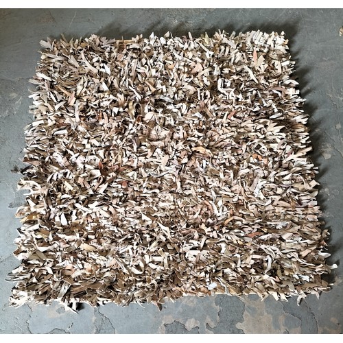 394 - Leather rag roll rug, approx 120 x 120cm