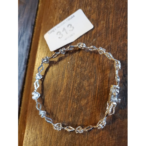 313 - Fabulous 925 sterling silver and diamond mini hearts bracelet,