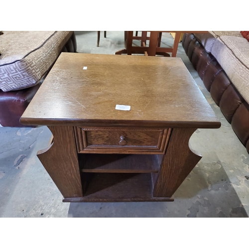 369 - Oak companion side storage table with magazine/newspaper racks. Front drawer and shelf.
Approx size ... 