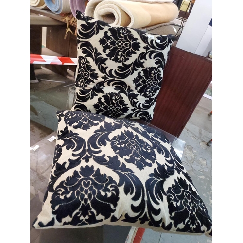 410 - Gorgeous large cushions in a light oatmeal with a flocked black pattern, measure approx 57cm square