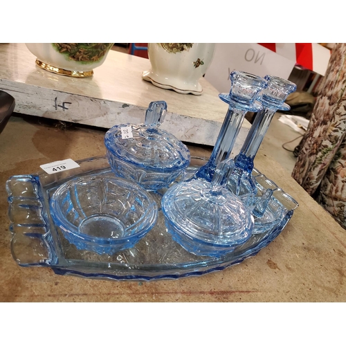 419 - A beautiful pale blue glass dressing table set on tray, including candlesticks and pretty lidded jar... 