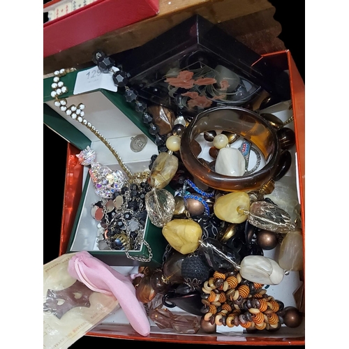 129 - A full box of gorgeous costume jewellery including a very sparkly cat brooch and some chunky bead ne... 