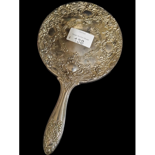 138 - White metal backed decorative hand mirror