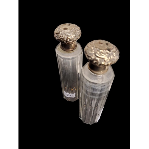 152 - 2 vintage silver topped perfume bottles