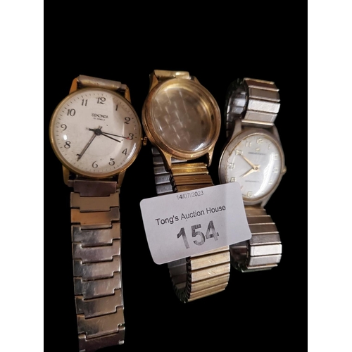 154 - 2 vintage wrist watches and a case and strap