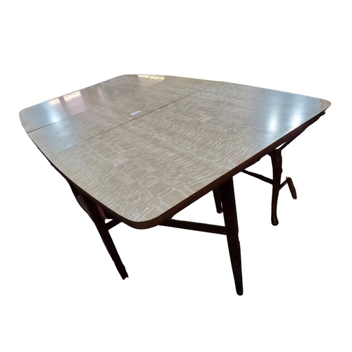 336 - Mid 20th century retro formica rectangular dropleaf table. Rounded edges. 
Colour - Neutrals, woodgr... 