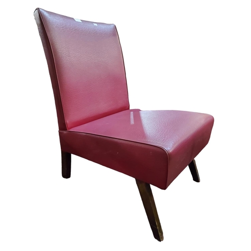 341 - 21st century nursing chair. Original claret red leatherette upholstery with piping detail.
Lovely pi... 