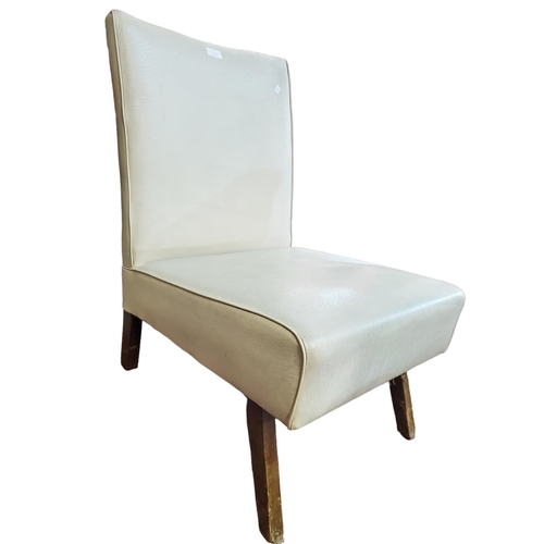 343 - 21st century nursing chair. Original chalk coloured leatherette upholstery with piping detail.
Lovel... 