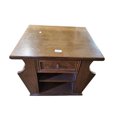 369 - Oak companion side storage table with magazine/newspaper racks. Front drawer and shelf.
Approx size ... 