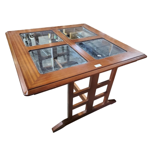 371 - Mahogany square coffee table. The top consists of four inlaid bevelled glass panel and lattice detai... 