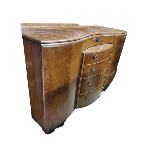 384 - Large art deco inspired sweeping curve fronted sideboard. Two side cupboards on either side of four ... 