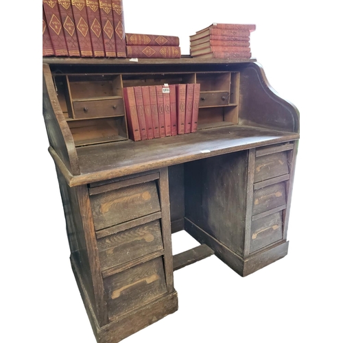 387 - Stunning antique oak writing desk. Desk top has useful storage for filling and writing essentials. B... 