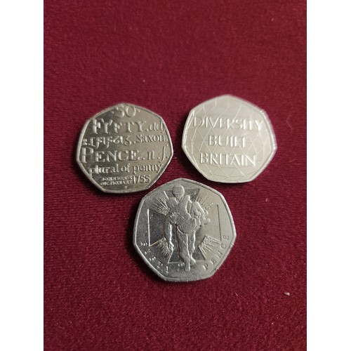 289 - 3 very collectible 50p pieces,